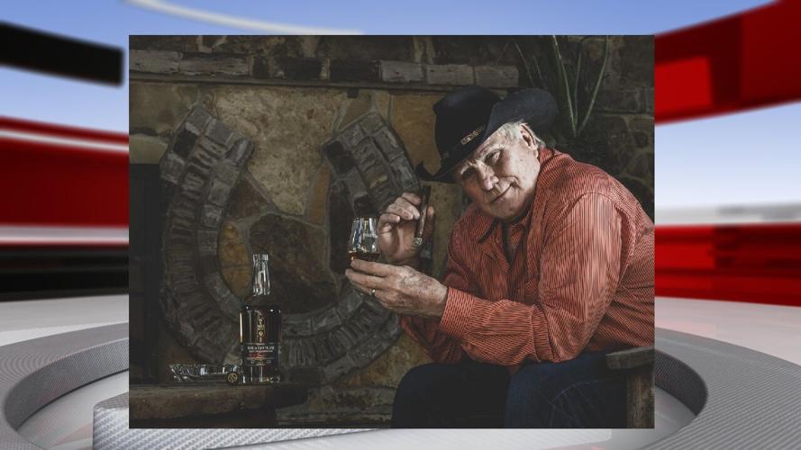 Terry Bradshaw with bourbon and cigar.jpg