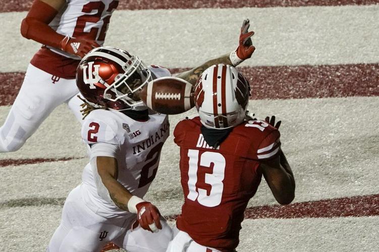 Wisconsin's Chimere Dike can't catch a pass with Indiana defensive back Reese Taylor