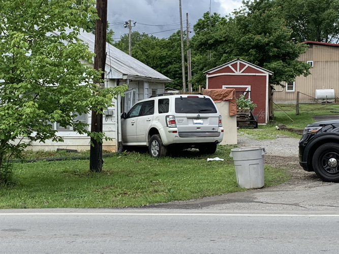 Vehicle into house after police chase
