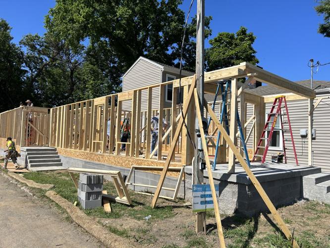 Holy high five builds house