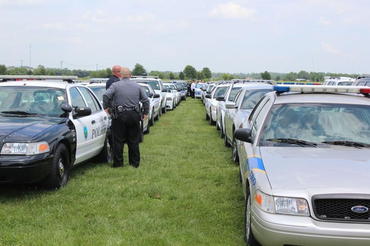 Funeral service and procession for Bardstown Police Ofc. Jason Ellis on May 30, 2013