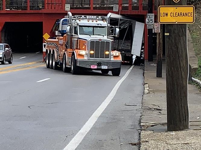 Semi stuck under Third Street Overpass