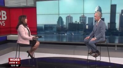 Valerie Chinn and Mayor Greg Fischer (on set)