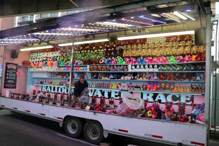 Crews set up booths along the Ohio River one day before Thunder Over Louisville 2023