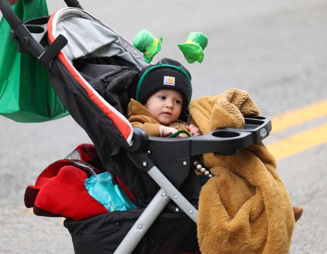 Baby wearing hat at parade
