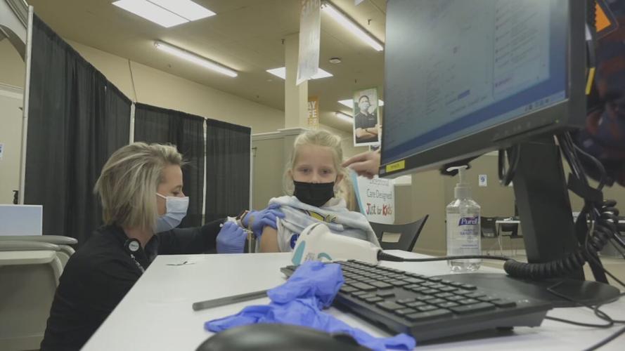 Child gets COVID-19 booster shot at Norton Healthcare