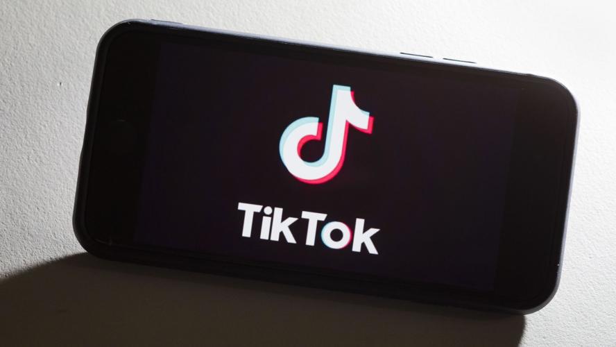 The TikTok logo on a smartphone display