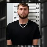 Man charged with grabbing young girl's leg in bathroom stall in southern Indiana