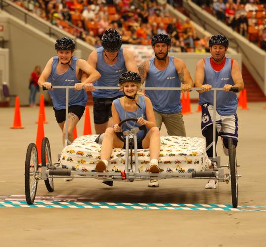 Team reaches finish line at Bed Races.JPG