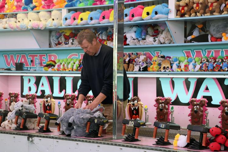 Crews set up booths along the Ohio River one day before Thunder Over Louisville 2023