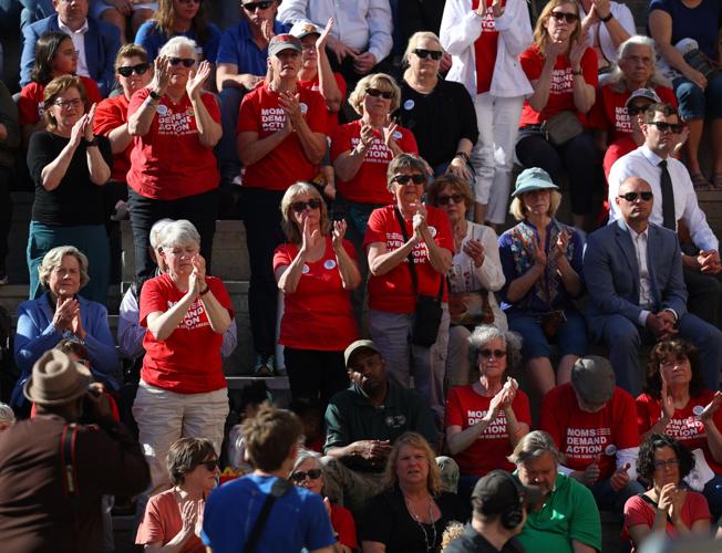 Crowd applauds at vigil.JPG