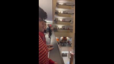 Students sing the National Anthem at the Louisville Hyatt Regency in Feb. 2023