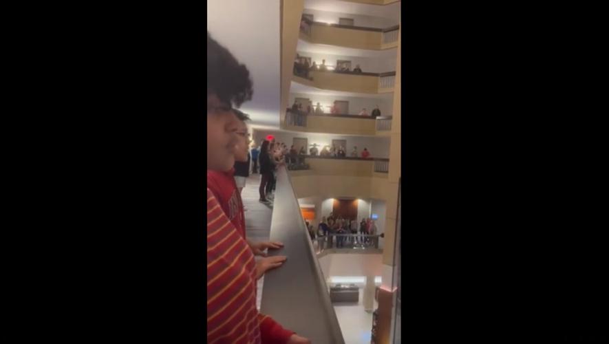 Students sing the National Anthem at the Louisville Hyatt Regency in Feb. 2023