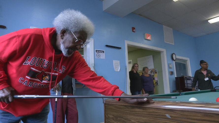 Stanley Baker playing pool at the Kling Center