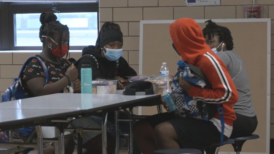 Masked students at lunch.jpeg