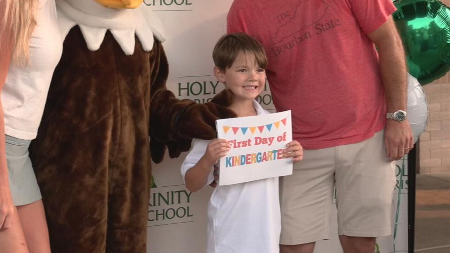 A kindergarten student on the first day of school at Holy Trinity School