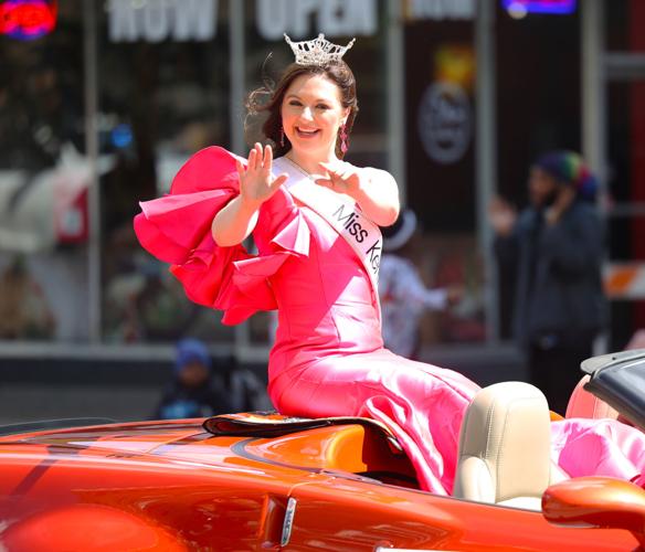 KDF queen waves to crowd.JPG