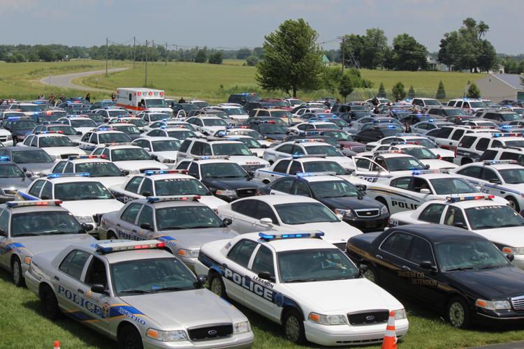 Funeral service and procession for Bardstown Police Ofc. Jason Ellis on May 30, 2013