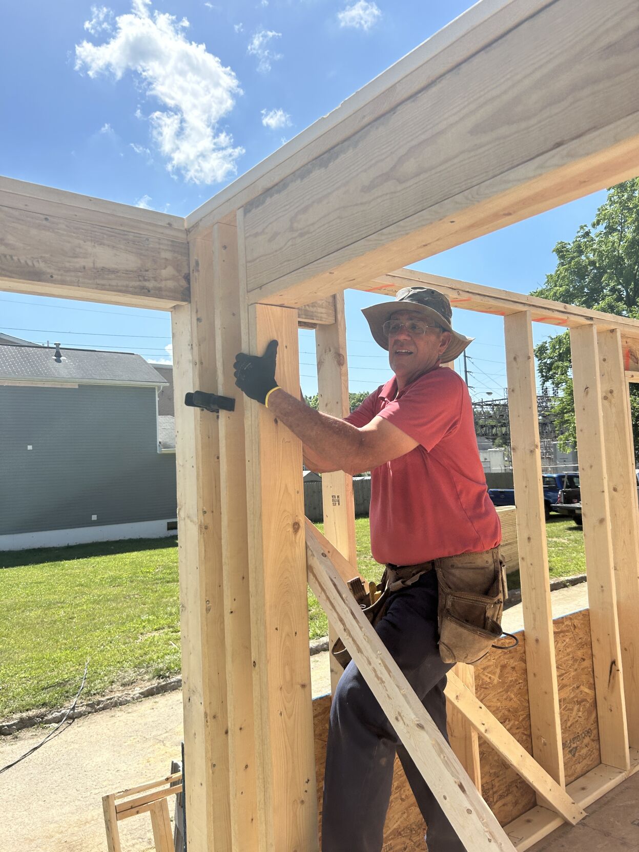 Holy high five builds house