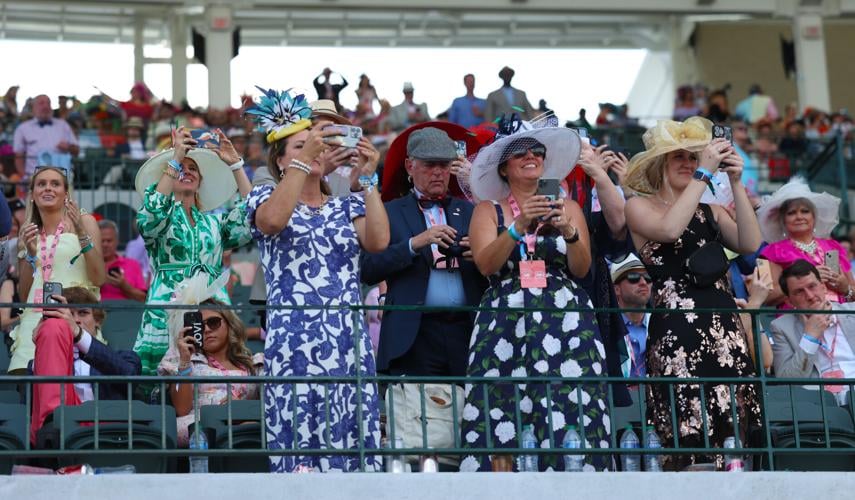 People cheer from First Turn Club after Kentucky Derby 150.JPG