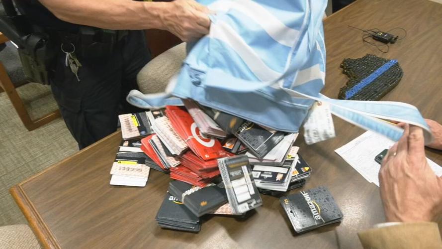 Bag of gift cards dumped on table - generic - file