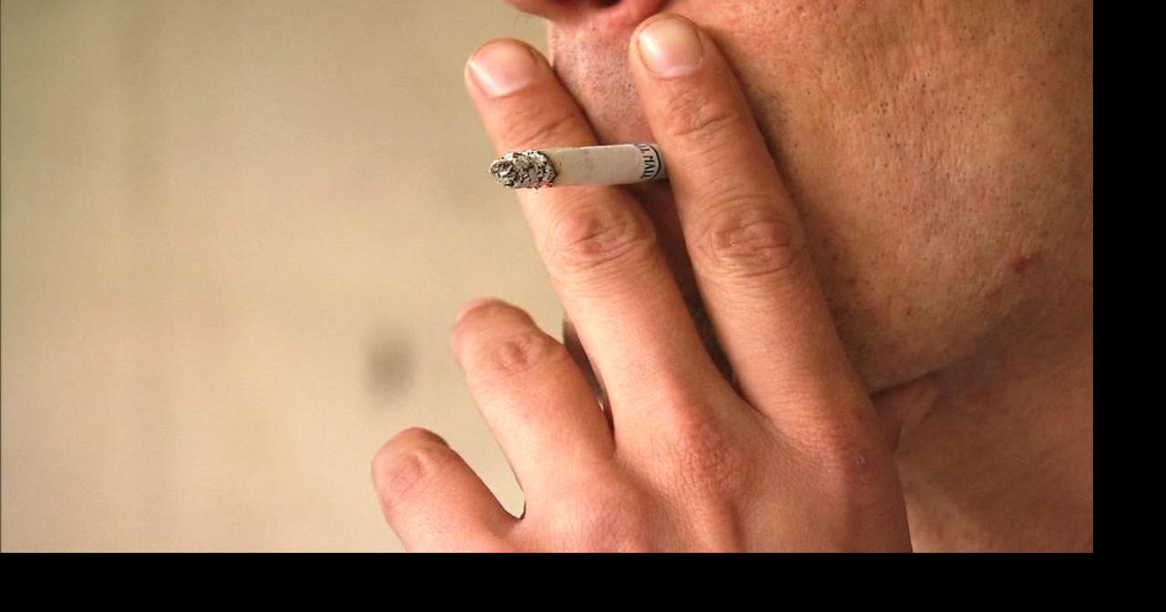 SUNDAY EDITION Kentucky's job protection for smokers comes under fire Indepth