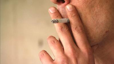 Smoker cigarette in mouth