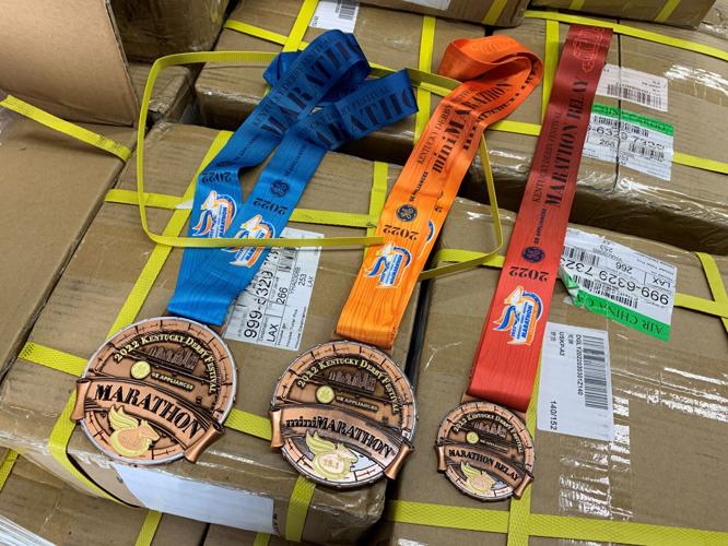 Distribute Finisher Medals - KY Run