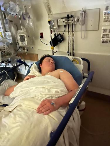 Tyler Morrison in hospital bed after lightning strike on Meadowbrook Golf Course in Lexington