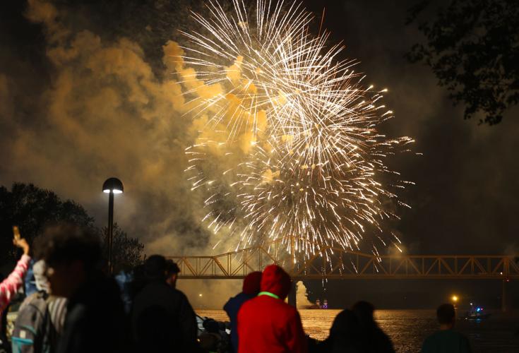 Thunder fireworks in the sky with people watching.JPG