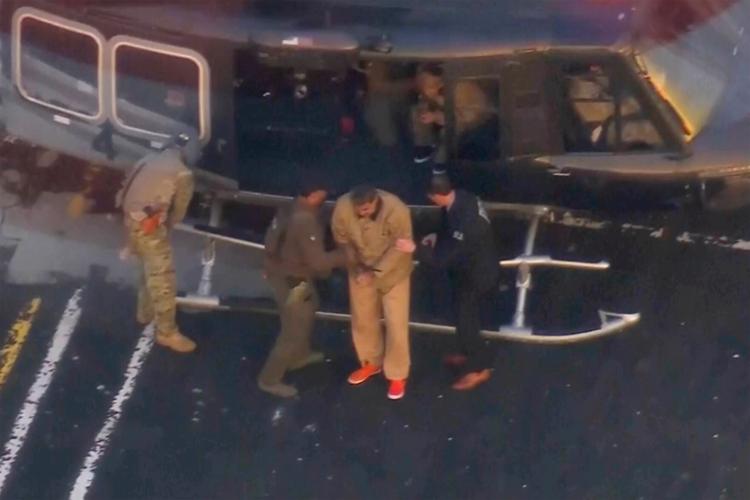 Venezuela US - Maduro in jail jumpsuit getting off helicopter 1-5-2026