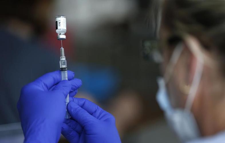 Nurse Jody Berry draws a syringe.jpeg