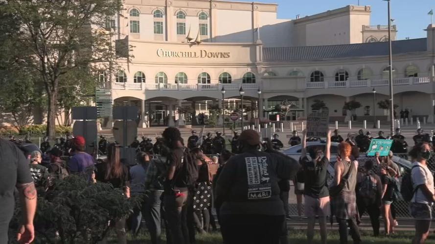 Protesters gather outside Churchill Downs during Derby