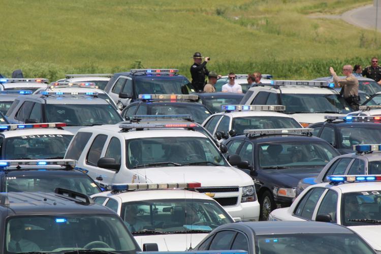 Funeral service and procession for Bardstown Police Ofc. Jason Ellis on May 30, 2013