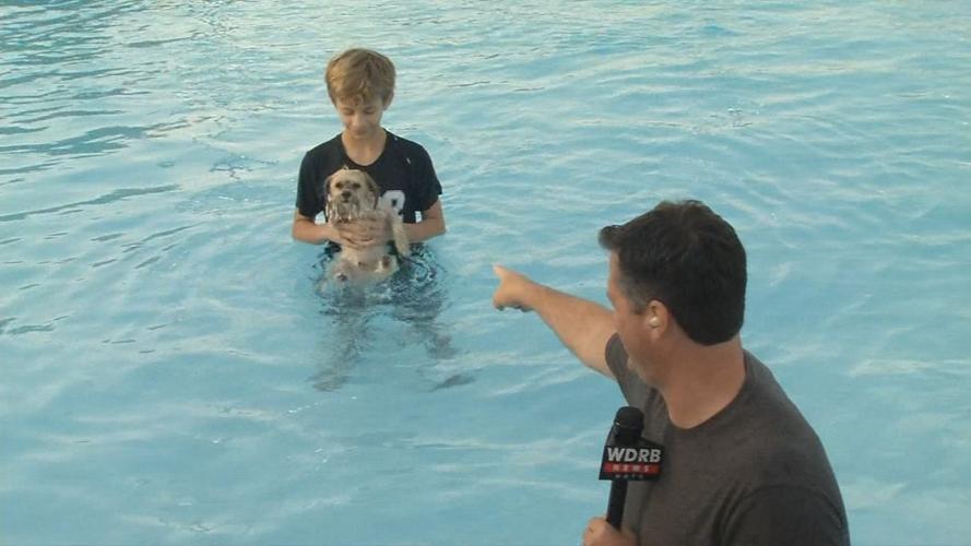 Doggie Dip - Keith points at boy with pup