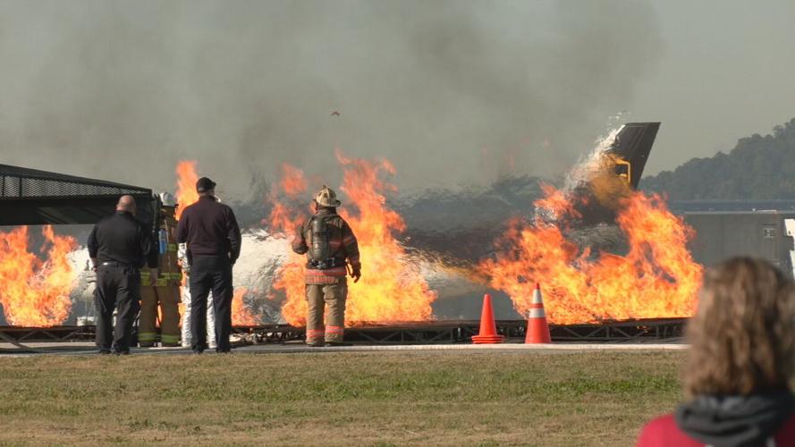 Flames pour during a simulated emergency at Louisville Muhammad Ali International Airport