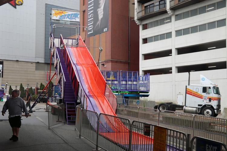 Crews set up booths along the Ohio River one day before Thunder Over Louisville 2023