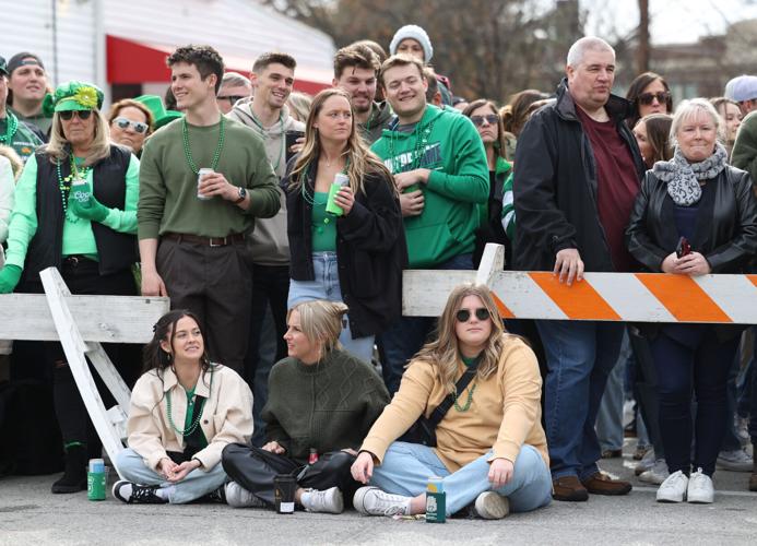 Group of people await parade