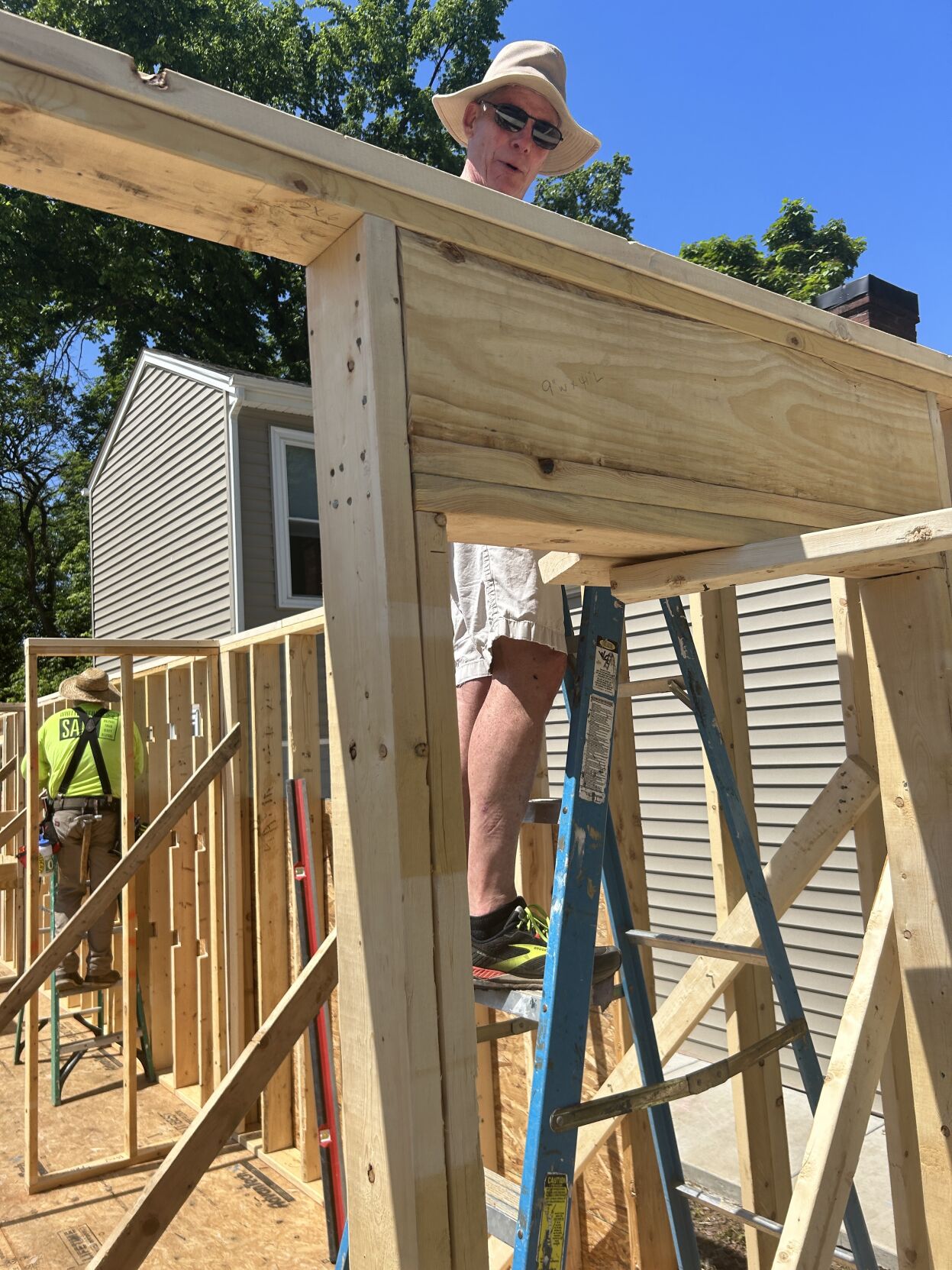 Holy high five builds house