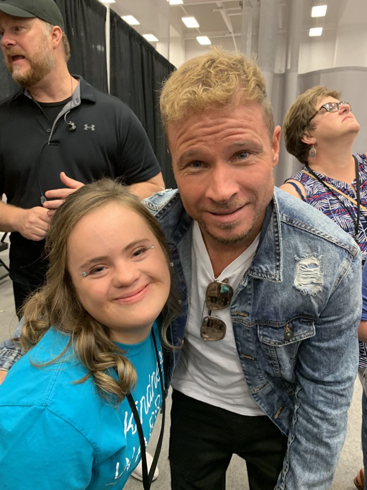 Brian Littrell poses with a member of Down Syndrome of Louisville