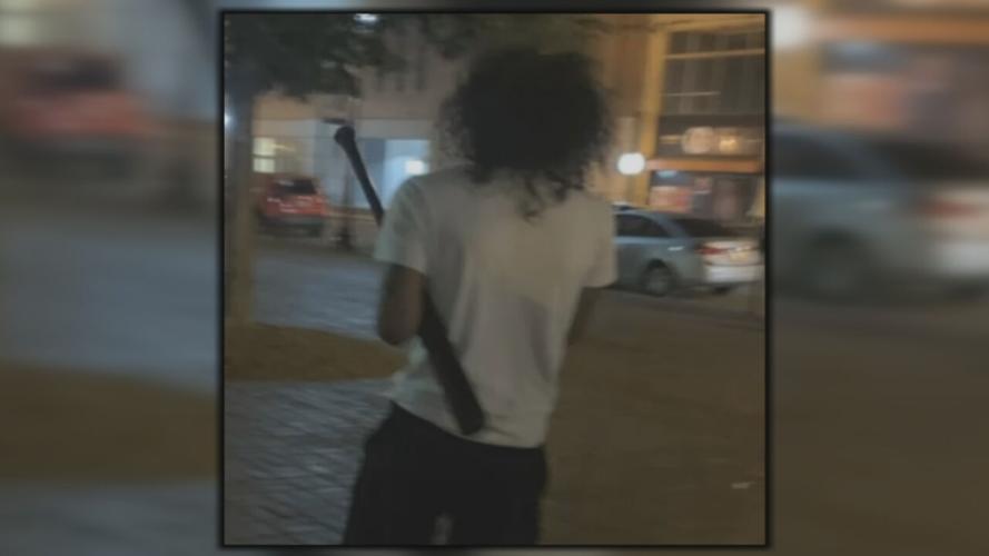 Individual with baseball bat at May / June 2020 downtown Louisville protest
