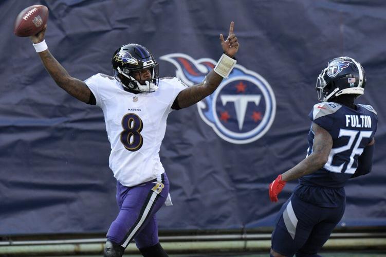 Baltimore Ravens quarterback Lamar Jackson (8) celebrates