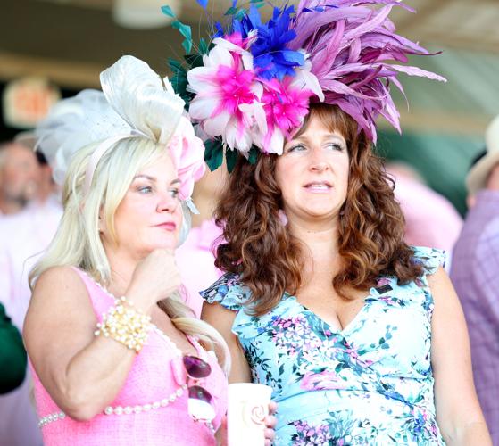 Woman watch race at Churchill Downs.JPG