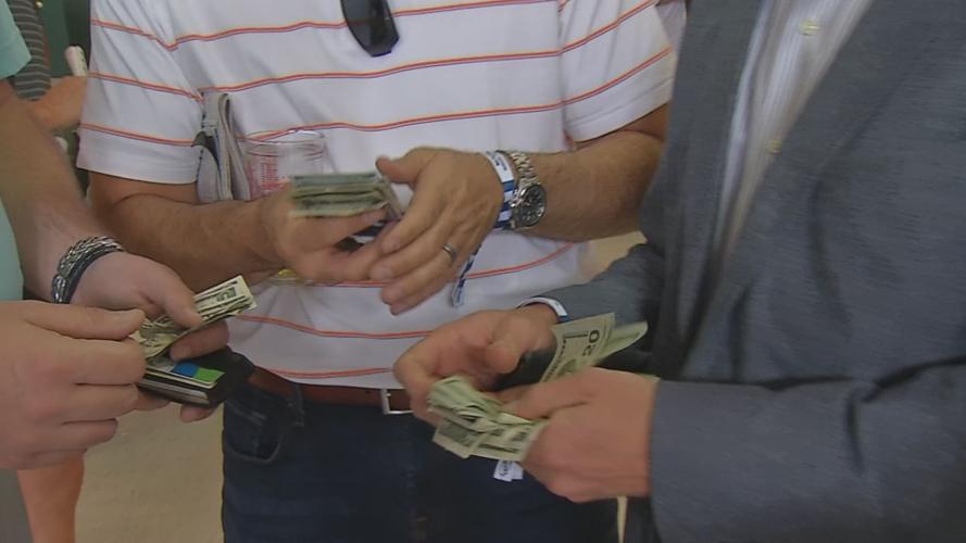 People holding cash generic.jpg