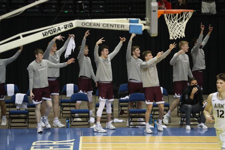 Members of the Bellarmine men's basketball team celebrate