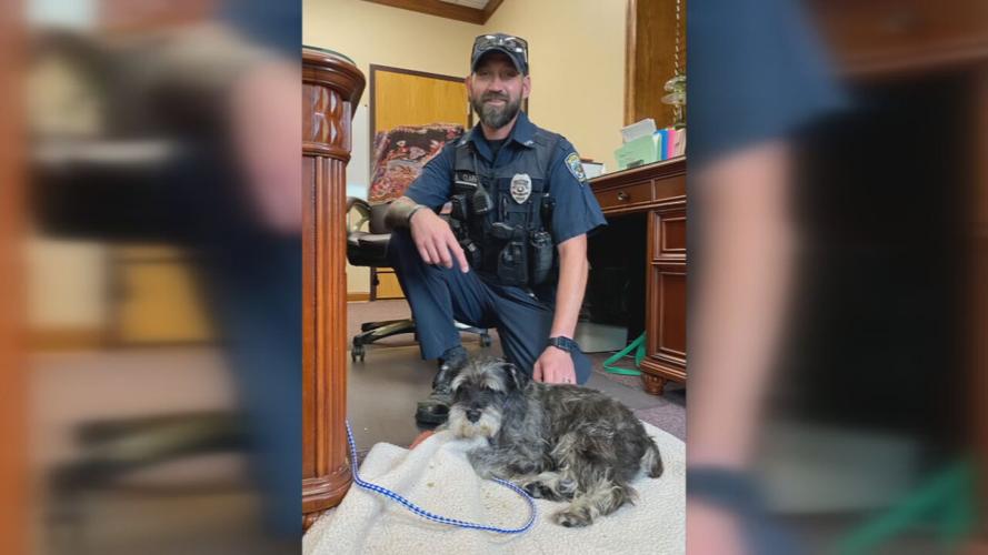 Charlestown Police Sgt. Adam Clark and Sammy