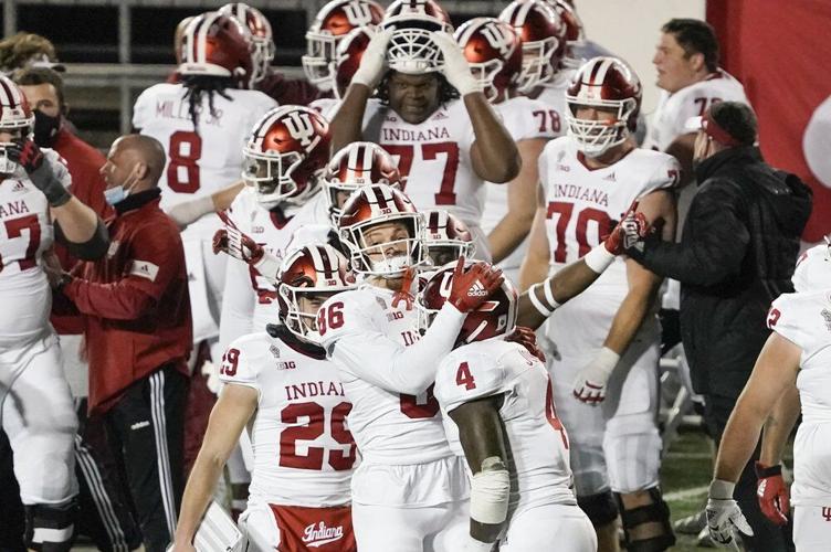 Indiana players celebrate in the final seconds of an NCAA college football game against Wisconsin
