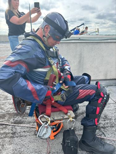 Window washers rappel from Norton Children's Hospital dressed as superheroes