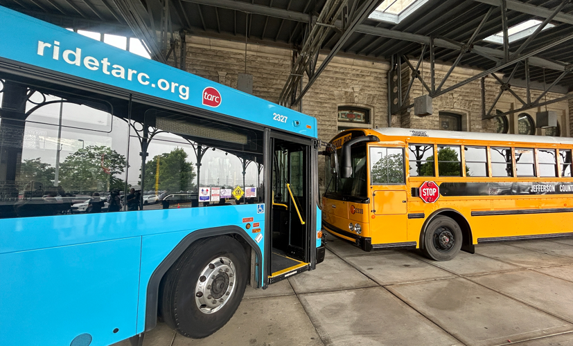 TARC bus facing JCPS Bus
