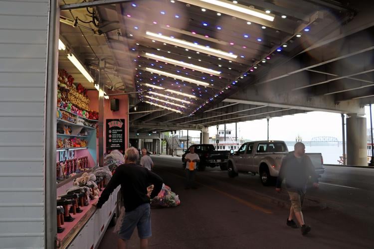Crews set up booths along the Ohio River one day before Thunder Over Louisville 2023